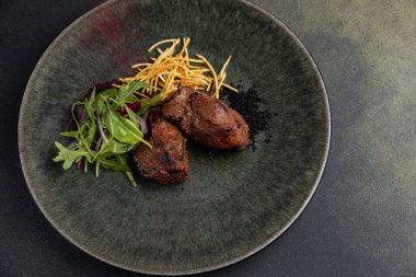 delicious meat on a plate from a restaurant