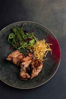 delicious meat on a plate from a restaurant