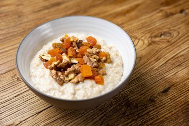 oatmeal with candied fruit and nuts
