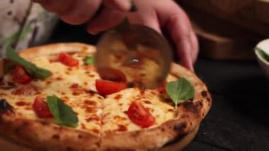 the chef prepares a delicious pizza