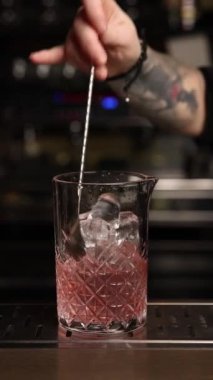 the bartender prepares a cocktail. Macro shooting