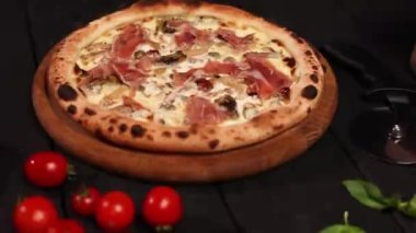 the chef prepares a delicious pizza