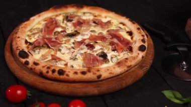 the chef prepares a delicious pizza