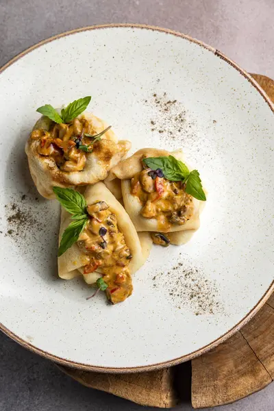 delicious pancakes with filling on a plate