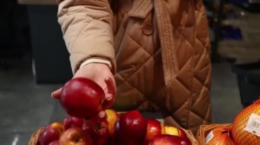 shelves with fruits and vegetables in a supermarket