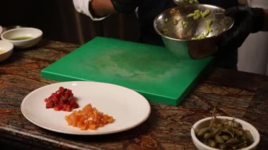 chef prepares vegan salmon in the kitchen