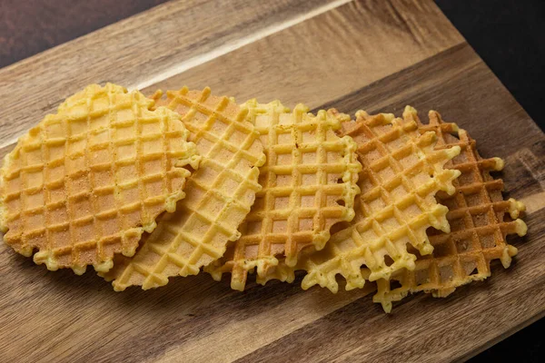 stock image Delicious cookies on a wooden board. Close up