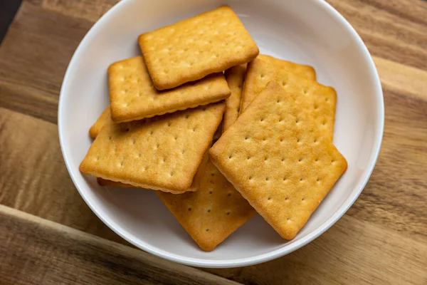 stock image Delicious cookies on a wooden board. Close up