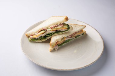 Delicious sandwich on a white background.  