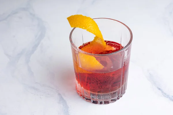 stock image Alcoholic Negroni cocktail on a light background