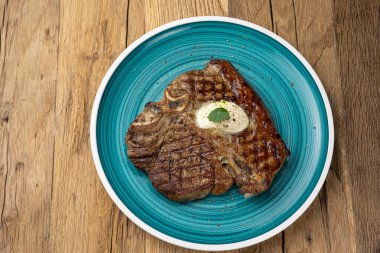 Mükemmel ızgara T-Bone Bifteği. Yakın plan.