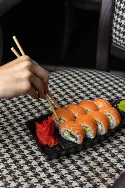 Japanese cuisine. Philadelphia rolls with salmon