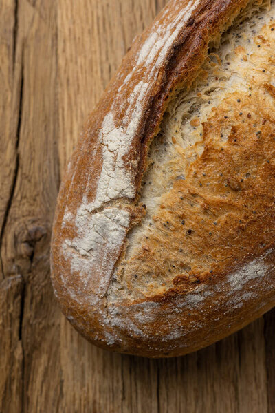 Freshly baked bread on a wooden table