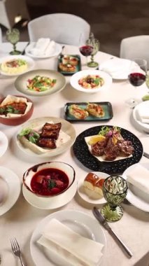 Festive banquet table in a restaurant. Served with delicious dishes. 