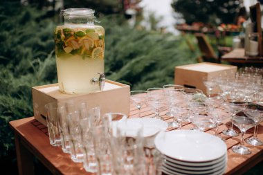 buffet with wine and champagne glasses
