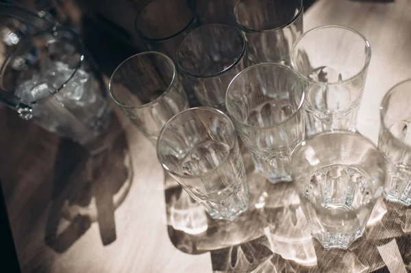 many empty clean shiny elegant glasses for alcohol