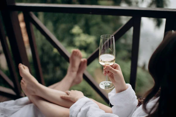 couple in love drinking champagne in the morning