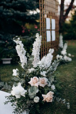 elegant delicate wedding floral decoration with white flowers