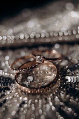 wedding rings on a jewelry background