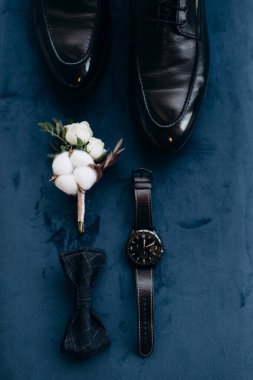 man 's shoes and a man's accessories