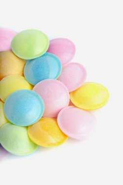  flying saucer candy features a crisp edible rice shell filled with tangy, fizzy sherbet powder at its core, delivering a burst of sour flavor in every bite clipart