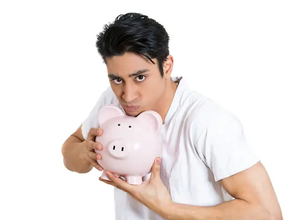 Young Greedy Stingy Man Holding Piggy Bank Isolated White Background — Stock Photo, Image