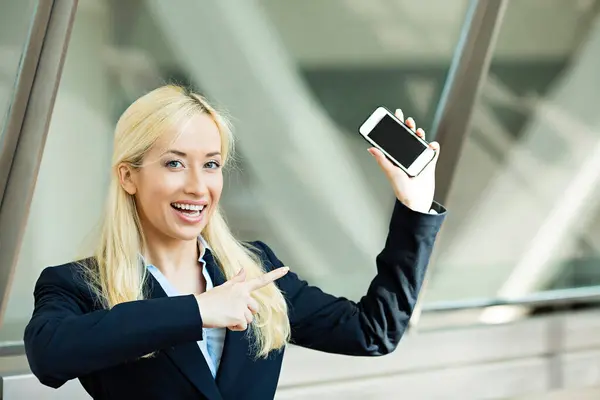 Happy Businesswoman Pointing Finger Mobile Phone — Stok Foto