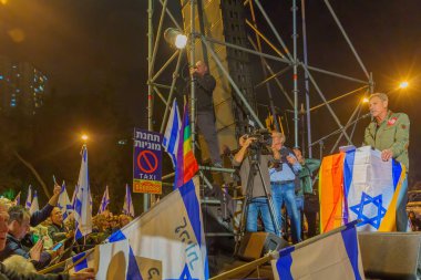 Haifa, Israel - January 28, 2023: Knesset Member Ram Ben Barak speaks to the crowd in a protest against the plans of the new government, claiming its anti-democratic, in Haifa, Israel