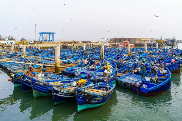 stock image Essaouira, Morocco - April 06, 2023: Scene of the fishing port, with boats and fishermen, in Essaouira (Mogador), Morocco