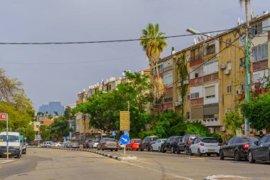 Haifa, Israel - May 05, 2023: View of Allenby Street, with various buildings, locals and visitors, in Haifa, Israel clipart