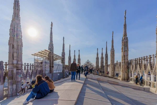 stock image Milan, Italy - March 02, 2022: View of the Cathedral (Duomo) rooftop terraces with visitors, in Milan, Lombardy, Northern Italy