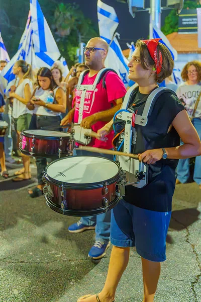 stock image Haifa, Israel - July 11, 2023: People protest with flags and various signs. Part of day of disruption against controversial judicial overhaul, in Haifa, Israel