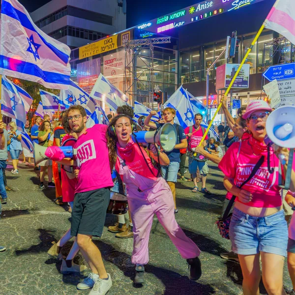 stock image Haifa, Israel - July 11, 2023: People protest with flags and various signs. Part of day of disruption against controversial judicial overhaul, in Haifa, Israel