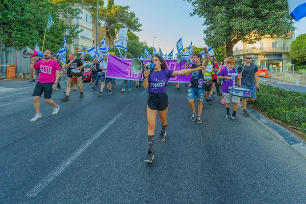 stock image Haifa, Israel - August 05, 2023: People march with various flags and signs, slogan: We shall not give up on a better future. Week 31 of protest against controversial judicial overhaul. Haifa, Israel