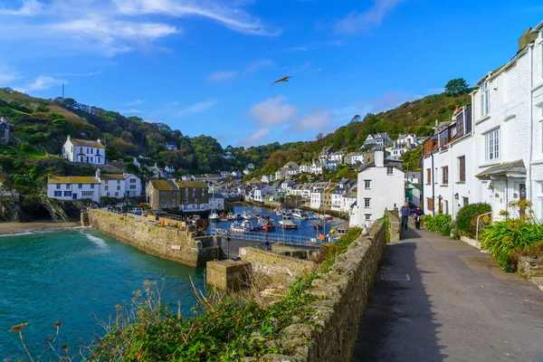 stock image Polperro, UK - October 16, 2022: View of the fishing port of the village Polperro, with locals and visitors, in Cornwall, England, UK