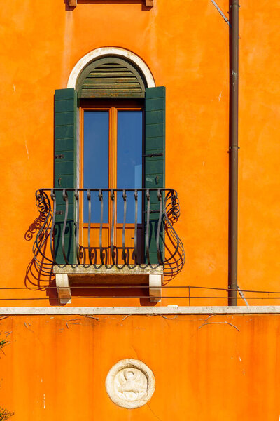 View of a typical window and carving, in Venice, Veneto, Northern Italy