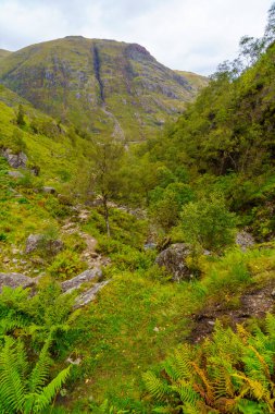 View of the landscape of Glencoe valley, in the West Highlands of Scotland, UK clipart
