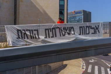 Haifa, Israel - April 02, 2024: Signs calling for Justise for Solomon Teka, prior to a verdict of the police officer that shot him dead 5 years ago. Near the courthouse, Haifa, Israel clipart