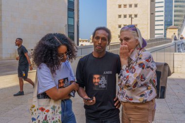 Haifa, Israel - April 02, 2024: Supporters of Solomon Teka family receive the news about a controversial verdict that acquitted the police officer that shot him dead in 2019. Haifa courthouse, Israel clipart