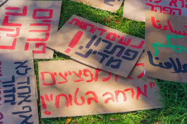 Haifa, Israel - May 31, 2024: View of various signs regarding feminism, violence against women, anti- war, part of a slut walk group rally, Haifa, Israel