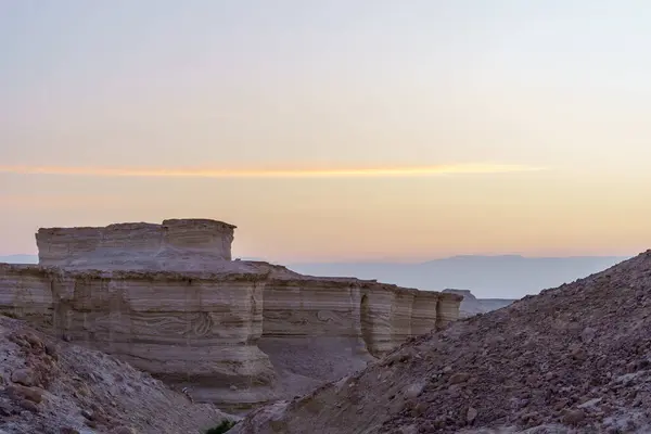 stock image Sunrise view of the Masada Marls rocks formation (Havarey Masada), between Masada fortress and the Dead Sea, Judaean Desert, southern Israel