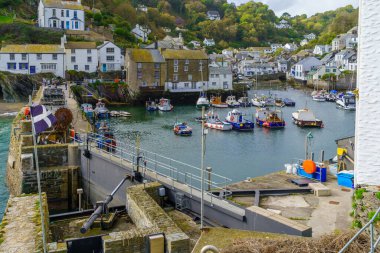 Polperro, UK - October 16, 2022: View of the fishing port of the village Polperro, in Cornwall, England, UK clipart
