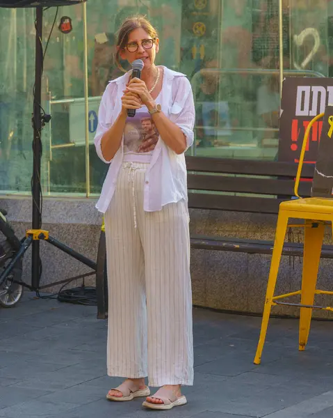 stock image Haifa, Israel - June 20, 2024: Idit Ohel, mother of Alon Ohel who is hostage of Hamas, speaks in an assembly of support for hostages families and call for a hostage deal, Haifa, Israel