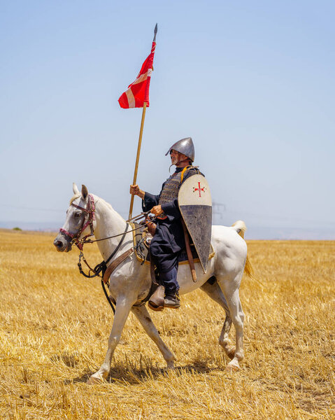 Lavi, Israel - July 05, 2024: Reenactment of the 1187 Battle of the Horns of Hattin (Ayyubid sultan Saladin defeated the crusaders): Knights on horses. Horns of Hattin, Israel