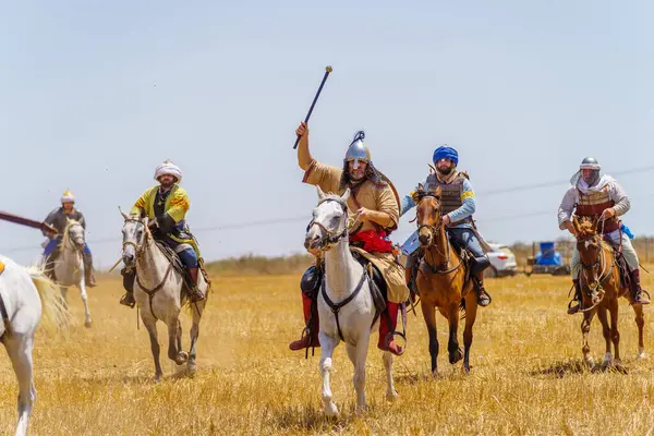 stock image Lavi, Israel - July 05, 2024: Reenactment of the 1187 Battle of the Horns of Hattin (Ayyubid sultan Saladin defeated the crusaders): Horseman (cavalry, knights) fight. Horns of Hattin, Israel