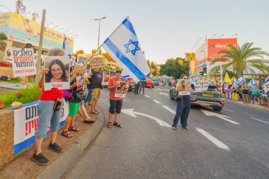 Hükümeti protesto etmek, ABD 'ye gitmeden önce rehine anlaşması yapmak. Hayfa