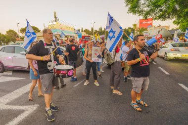 Hükümeti protesto etmek, ABD 'ye gitmeden önce rehine anlaşması yapmak. Hayfa