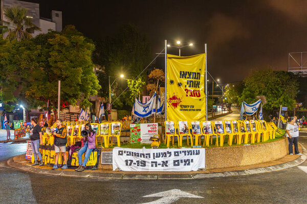 Haifa, Israel - November 02, 2024: People protest in the street, support of the hostages, calling for a deal, in Haifa, Israel
