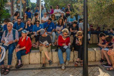 Haifa, Israel - November 15, 2024: People attend an assembly of support of the hostages, calling for a deal, in Haifa, Israel clipart