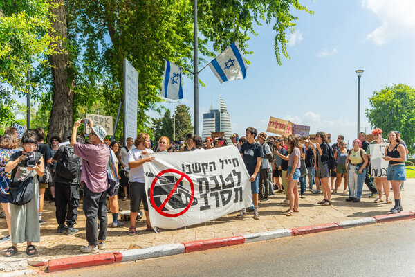 Haifa, Israel - August 17, 2025: People protest against the war, and to refuse to military service, in Haifa, Israel